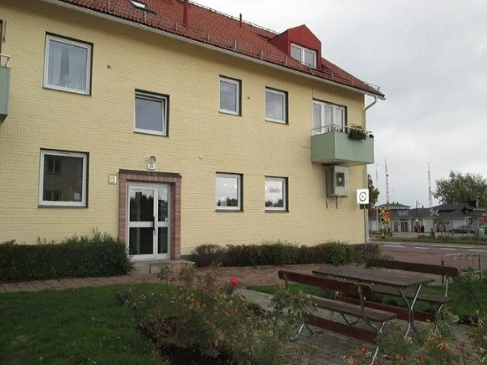 Yellow apartment building.